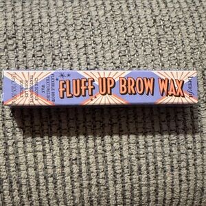 Benefit Fluff Up Brow Wax in Purple and Orange Packaging
